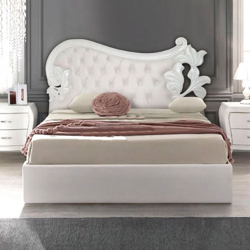Letto matrimoniale in legno intagliato  con testiera imbottita in ecopelle  185x204xh.160 cm